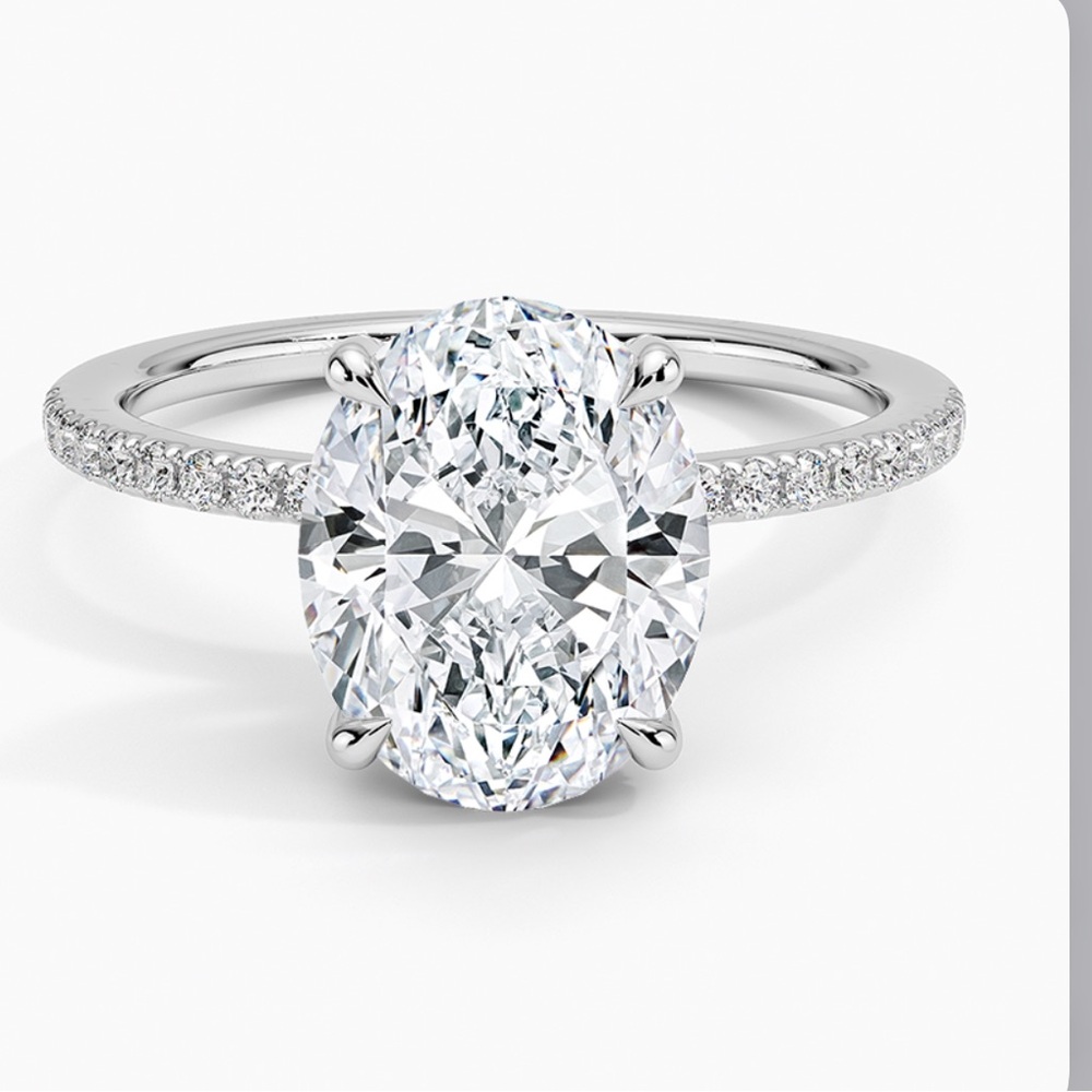 Silver Diamond Solitaire Ring with Pave Band